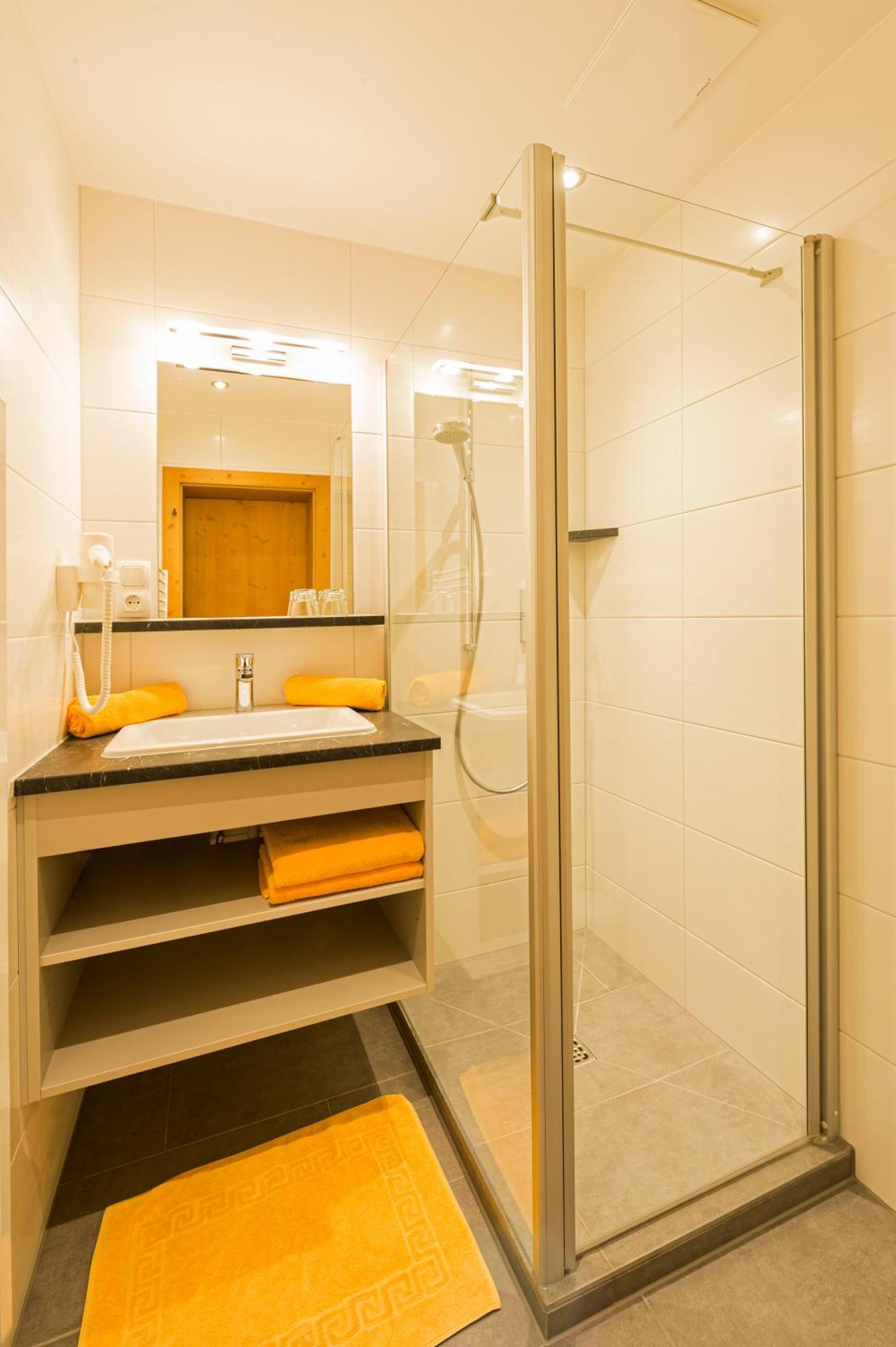 Apartments Tirolerhaus Kössen Chambre photo